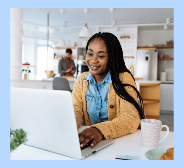 a woman training to be a freight broker on a laptop